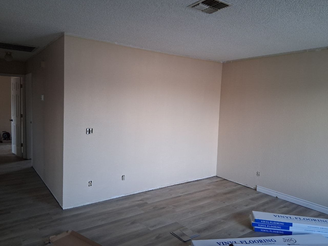 Bedroom with new plank vinyl floor going in